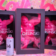 Richard Orlinski art pieces with a spray can on a colorful background