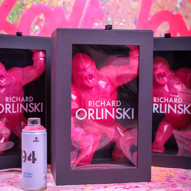 Richard Orlinski art pieces with a spray can on a colorful background