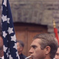 FRANÇOIS GRAGNON - Steve McQueen with Flag 1964